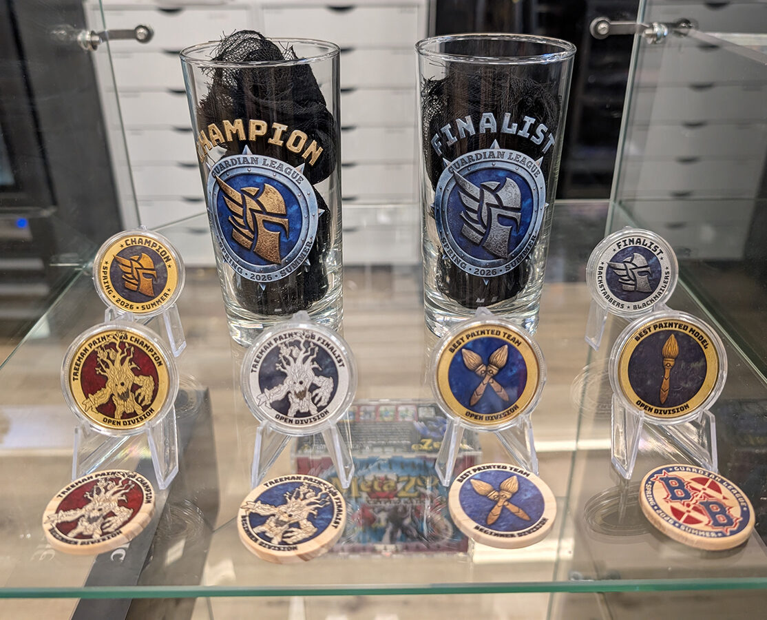 A custom laser-cut and engraved Blood Bowl league prizing set.